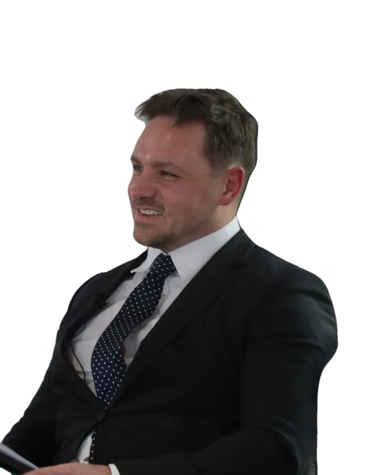 Dr Lewis Haydon laughing on the panel at a Dragons’ Den-style pitch event in Birmingham, UK